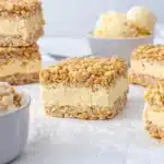 rice krispie ice cream sandwich served with scoops of vanilla ice cream