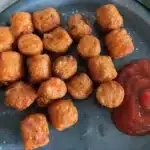 Cooked Alexia sweet potato puffs with ketchup