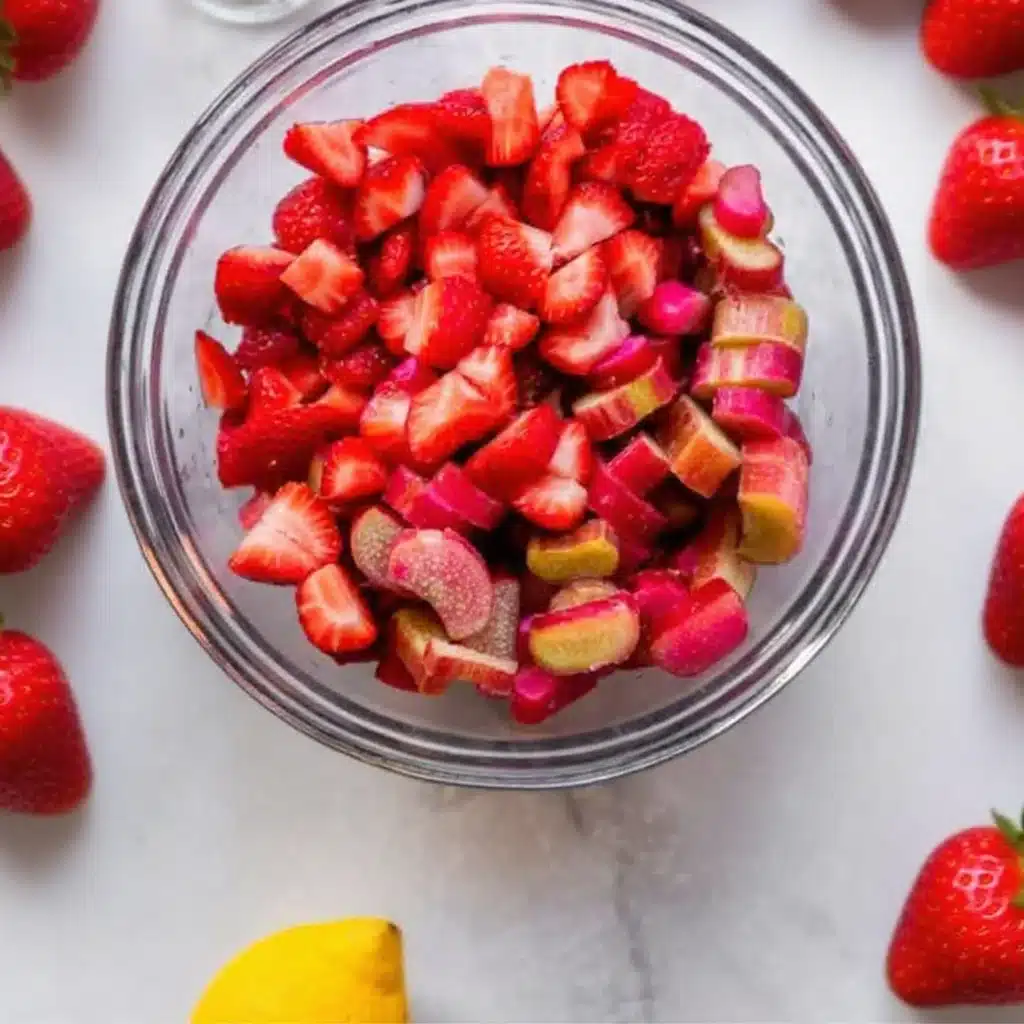 Chopped strawberries and rhubarb in a bowl for pie filling