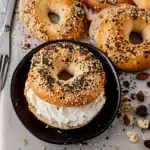 protein bagel sandwich with cream cheese on a plate