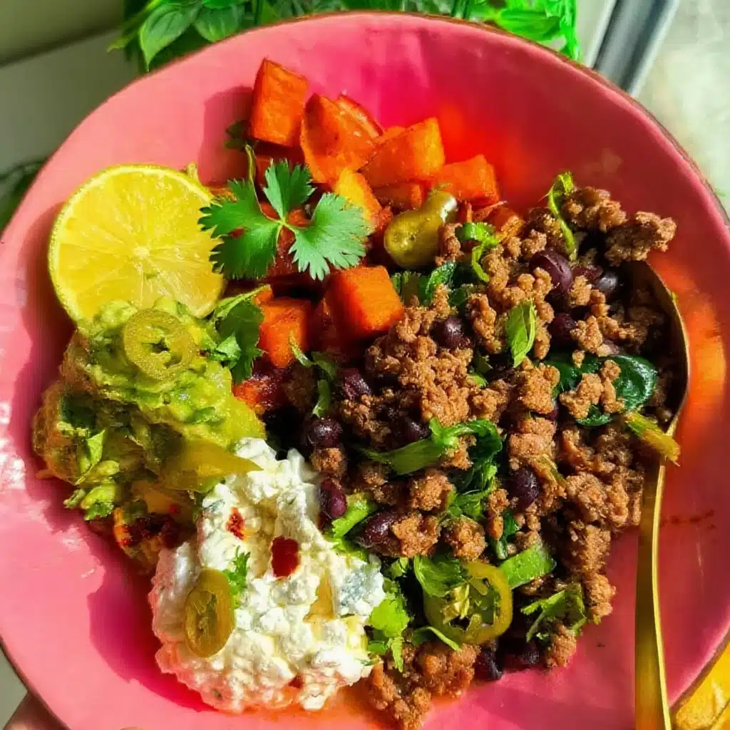 Tex-Mex ground beef bowl with guacamole and jalapeños