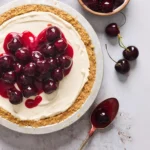 Philadelphia No Bake Cheesecake with cherry topping on graham cracker crust